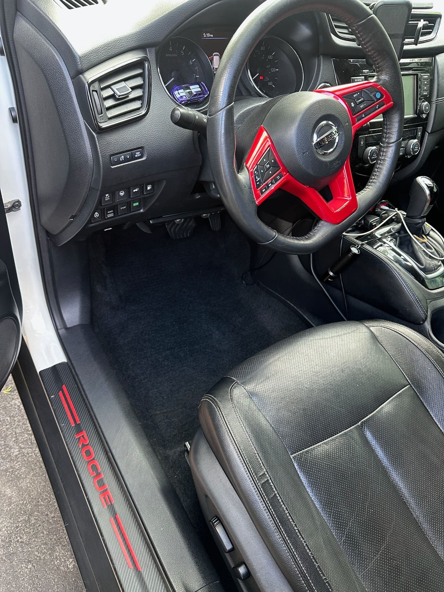 Same Nissan Rogue interior — spotless carpets, polished trim, and a steam-cleaned cabin after Mike's Signature detail